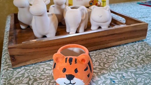 Tiger plant pot decorated at Bateman's